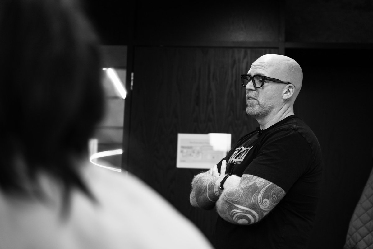 Jean-Claude Vacassin listening at a workshop